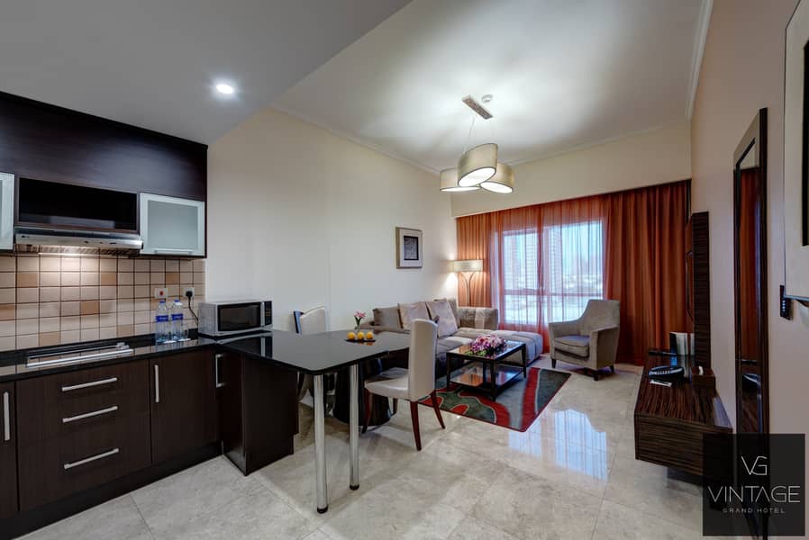 6 Ghaya Grand Hotel Dubai - Two Bedroom Living Room. jpg