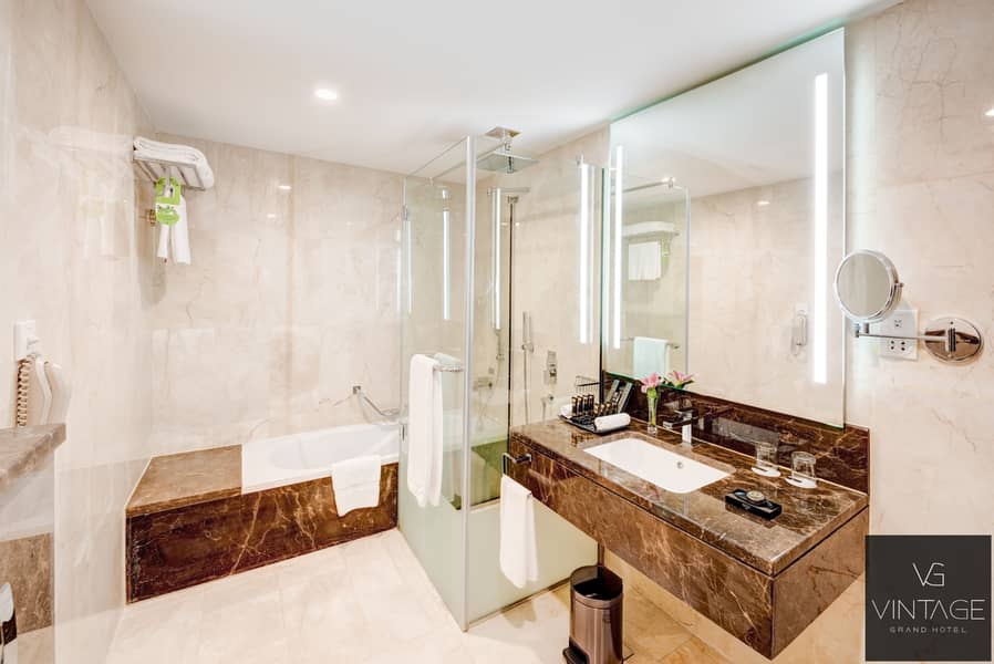 9 Ghaya Grand Hotel Dubai  - One Bedroom Bathroom 6-2. jpg
