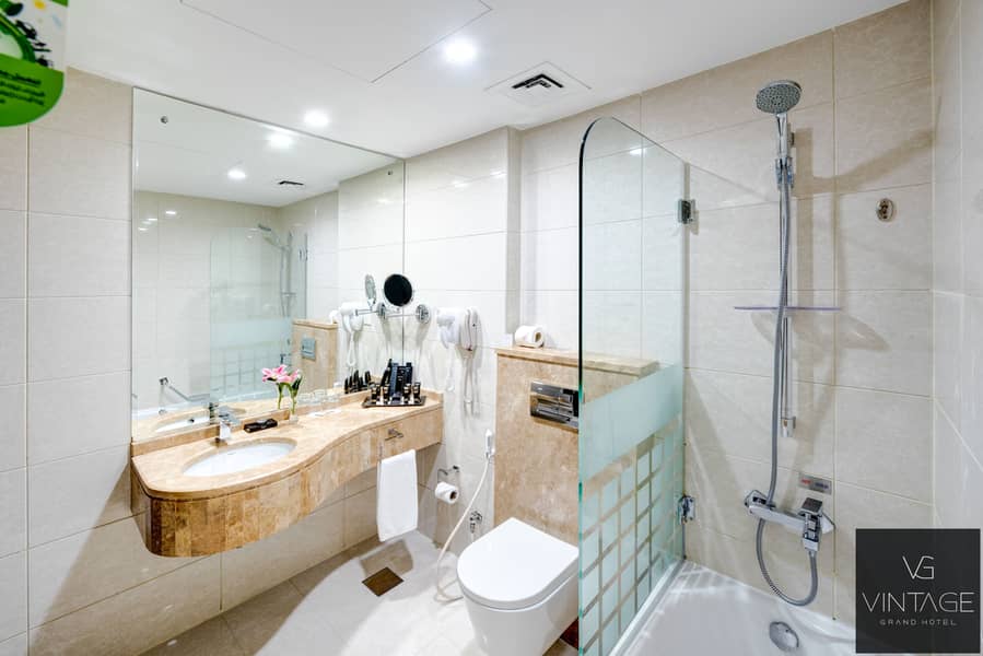 10 Ghaya Grand Hotel Dubai  - One Bedroom Bathroom 5-2. jpg