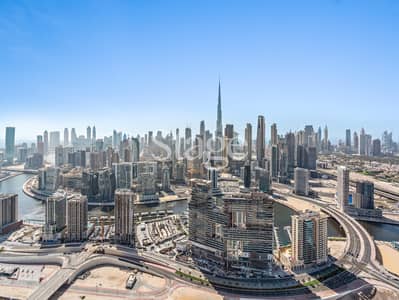 1 Bedroom Flat for Rent in Business Bay, Dubai - Fully Furnished | Burj and Canal View | High Floor