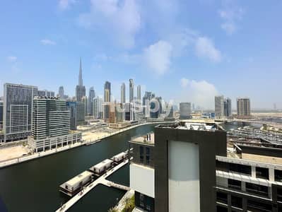 1 Bedroom Flat for Sale in Business Bay, Dubai - Burj and Canal View | High Floor | Unfurnished