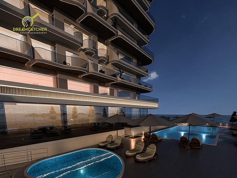 10 night view both swimming pools PS Bayut 9 - Copy. jpg