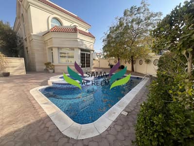 Exquisite 5-Bedroom Villa with Study & Private Pool in Umm Suqeim 1