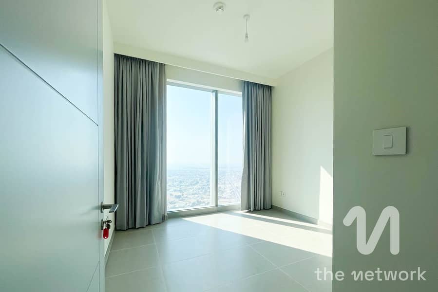 High-Floor 2BR | Burj Views | Prime Location