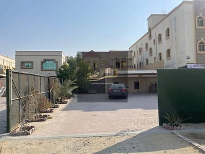 Residential and commercial villa for rent in Ajman in Al Rawda 1 area in installments, beautiful location close to the main street
