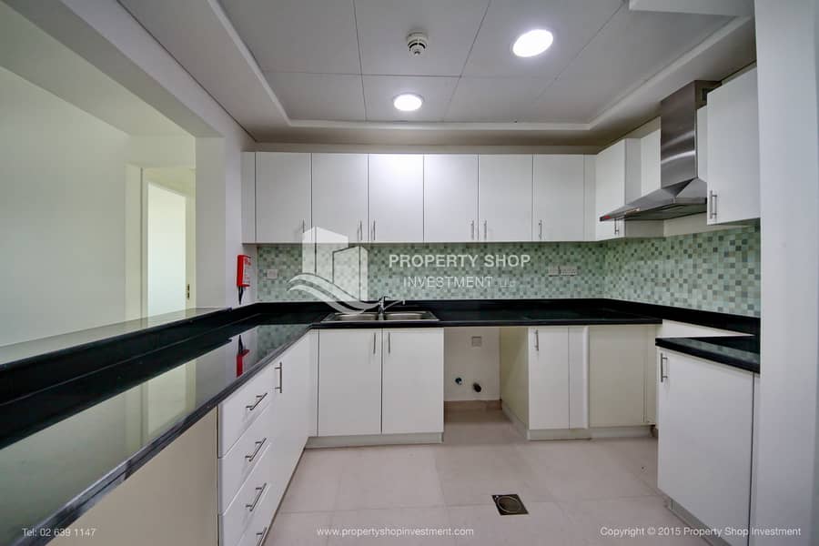 9 2-bedroom-abu-dhabi-al-ghadeer-terrace-apartment-kitchen. JPG