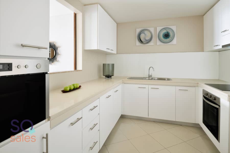2 Two Bedroom Residence Suite with Creek and Urban View - Kitchen. JPG