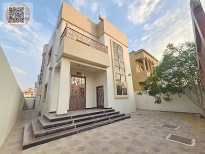 Villa for rent in Ajman, Al Muwaihat area, two floors, Arabic design, with air conditioning.