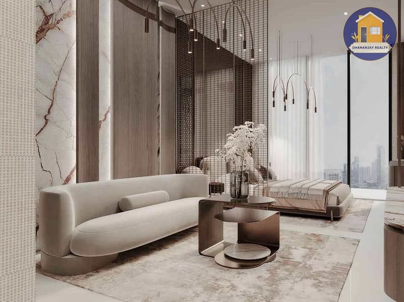 2 stylish living room in a 1 bedroom apartment at Laya Courtyard in Dubai Studio City. jpg