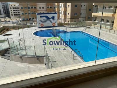 2 Bedroom Flat for Rent in International City, Dubai - Pool. jpg