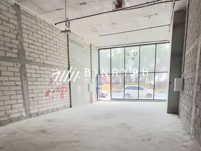 Shop for Rent in Jumeirah Village Circle (JVC), Dubai - SHELL AND CORE | ROAD FACING | BRAND NEW BUILDING
