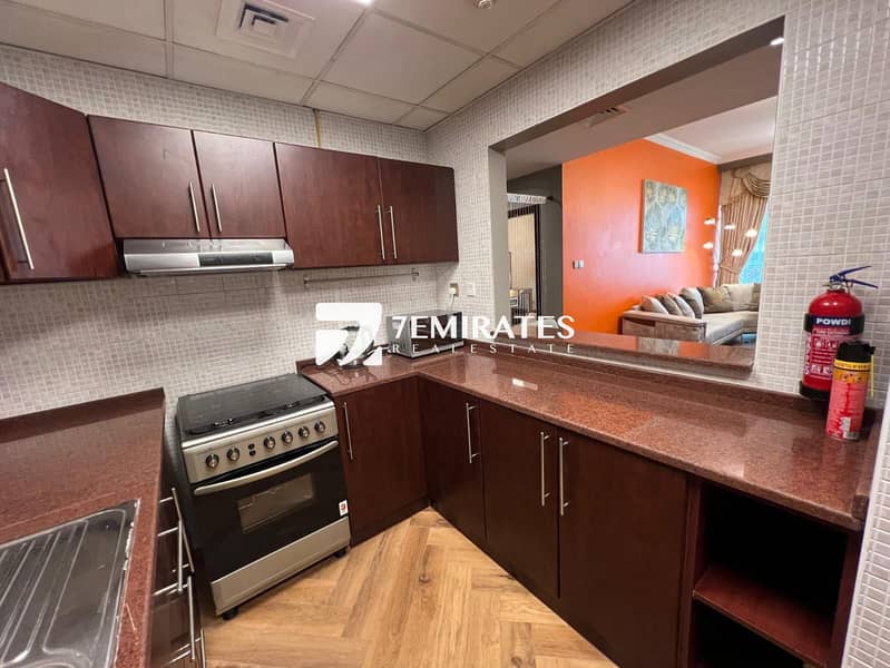 19 7Emirates-scala-tower-apartment-business-bay-burj-khalifa-&-canal-view-open-kitchen-property-in-dubai. jpeg