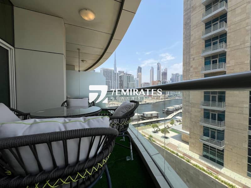 25 7Emirates-scala-tower-apartment-business-bay-burj-khalifa-&-canal-view-balcony-chair-property-in-dubai. jpeg