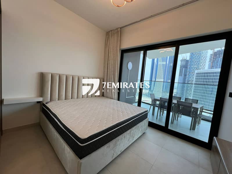 7 7emirates-bingahtti-canal-apartment-bedroom-view-with-balcony-property-in-dubai. jpeg