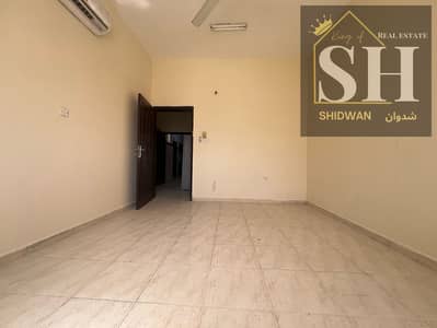 A bedroom and a living room for rent with a separate lounge and a spacious balcony.