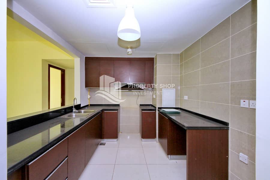 10 2-bedroom-apartment-al-reem-island-marina-square-marina-blue-kitchen. JPG