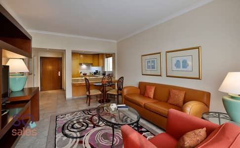 1 Bedroom Hotel Apartment for Rent in Deira, Dubai - 1BR - Living Room. jpg