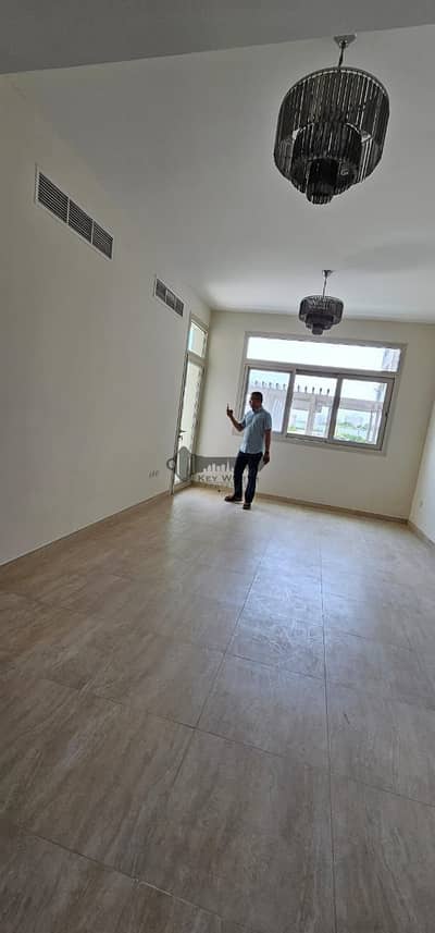 2 Bedroom Flat for Rent in Al Furjan, Dubai - living. jpg