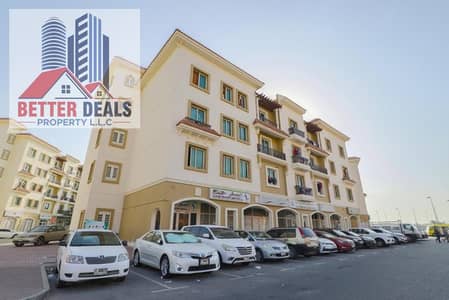 محل تجاري  للايجار في المدينة العالمية، دبي - 251018690. jpg