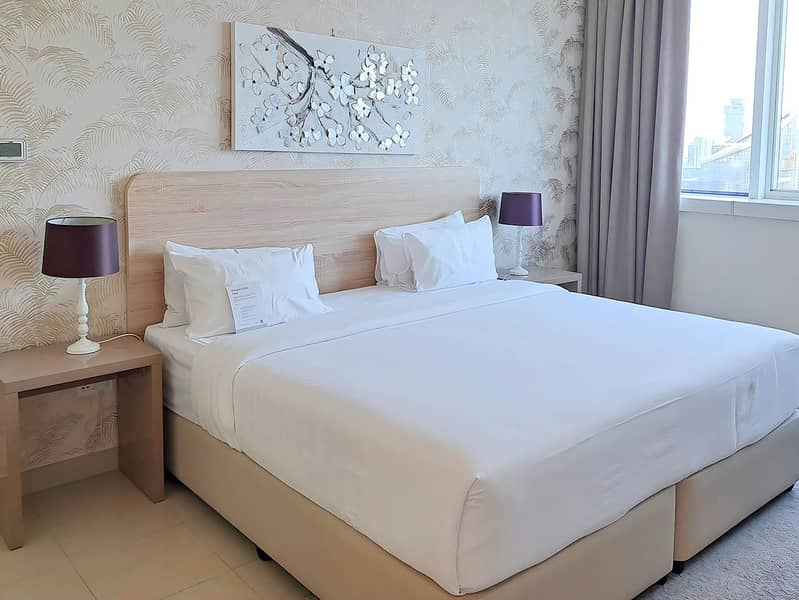 9 One Brdroom Deluxe_Bedroom. jpg