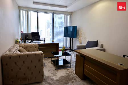 Office for Sale in Business Bay, Dubai - Rented Office in Prime Spot | Secure Income