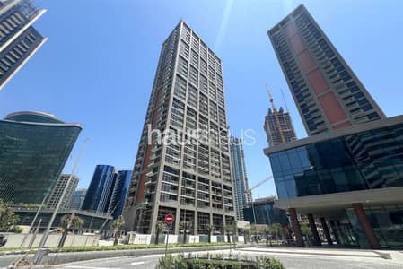 1 Bedroom Flat for Sale in Business Bay, Dubai - One Bed | Burj and Sea View | Corner Unit
