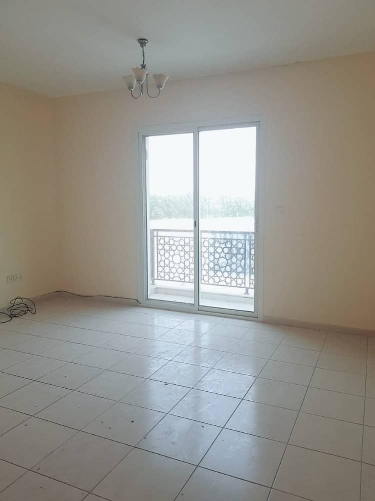 STUDIO WITH BALCONY FOR RENT IN EMIRATES CLUSTER INTERNATIONAL CITY ONLY IN 21000/-