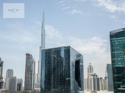 فلیٹ 1 غرفة نوم للايجار في الخليج التجاري، دبي - The-Opus-by-OMNIYAT-Exterior-7. jpg