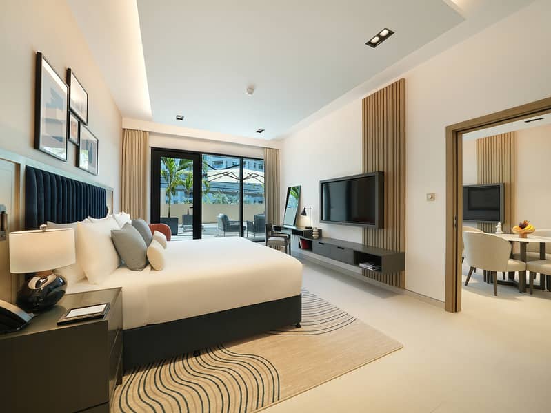 4 CMTP_Deluxe_One_Bedroom_with_terrace_bedroom-reception. jpg