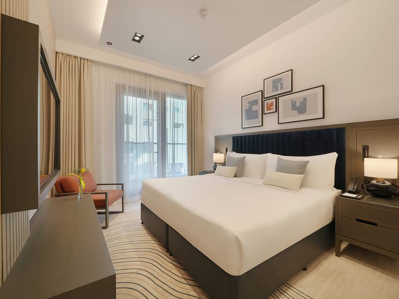 5 CMTP_Deluxe_One_Bedroom_Bedroom. jpg
