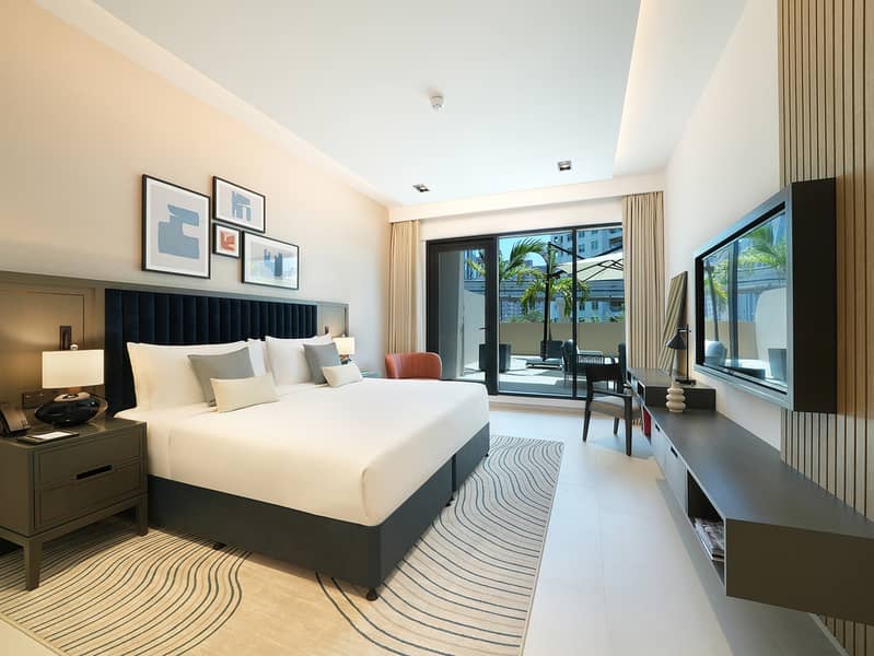 6 CMTP_Deluxe_One_Bedroom_with_terrace_bedroom. jpg