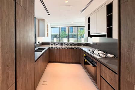 4 Bedroom Villa for Rent in Tilal Al Ghaf, Dubai - Open Kitchen | Integrated Appliances | Internal