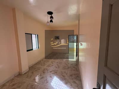 Studio for annual rent, Al Rashidiya 1, Al Minya Street, 15,000 in four or six installments, check deposit, without air conditioning, large area with