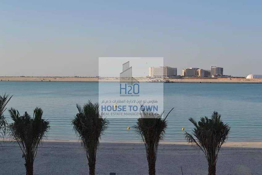 7 Actual-tCXRwzdn6mD4S12snXjF5036view_of_the_beach_at_al_muneera_from_the_roof_of_the_retail_building_looking_out_towards_yas_island. jpg