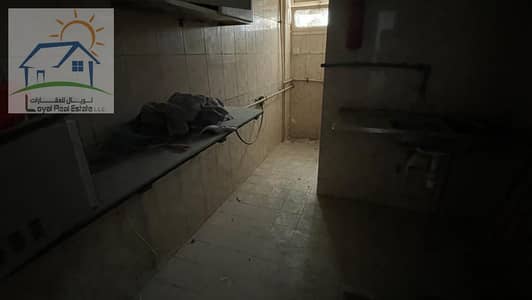 阿治曼工业园区， 阿治曼 员工宿舍待租 - Bldg 413 Labor kitchen. jpg