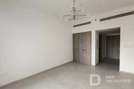 Studio for Rent in Jumeirah Village Circle (JVC), Dubai - Pool View | Semi Furnished | Mid Floor
