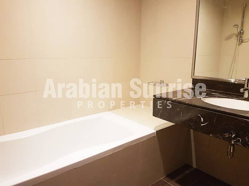 9 Sun-tower-1BR-1612A-1014sft-Bathroom2. jpg
