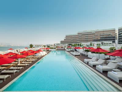 فلیٹ 1 غرفة نوم للايجار في نخلة جميرا، دبي - Fluid Pool 1. jpg