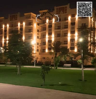 2 Bedroom Apartment for Sale in Al Yasmeen, Ajman - night blding. jpg