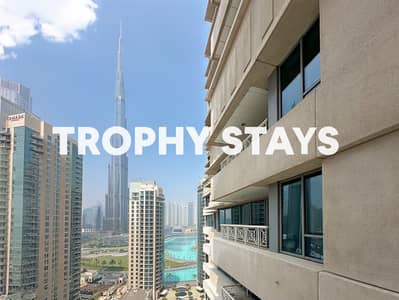 1 Bedroom Flat for Rent in Downtown Dubai, Dubai - b2841c8e344a499fabb2dde430b31540-MediumOriginal. jpg