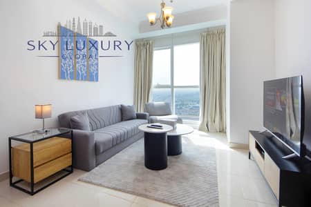 شقة 1 غرفة نوم للايجار في الخليج التجاري، دبي - A - Living room (1). jpg