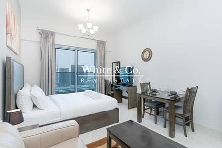 Studio for Sale in Business Bay, Dubai - Furnished | Canal + Burj views | High ROI