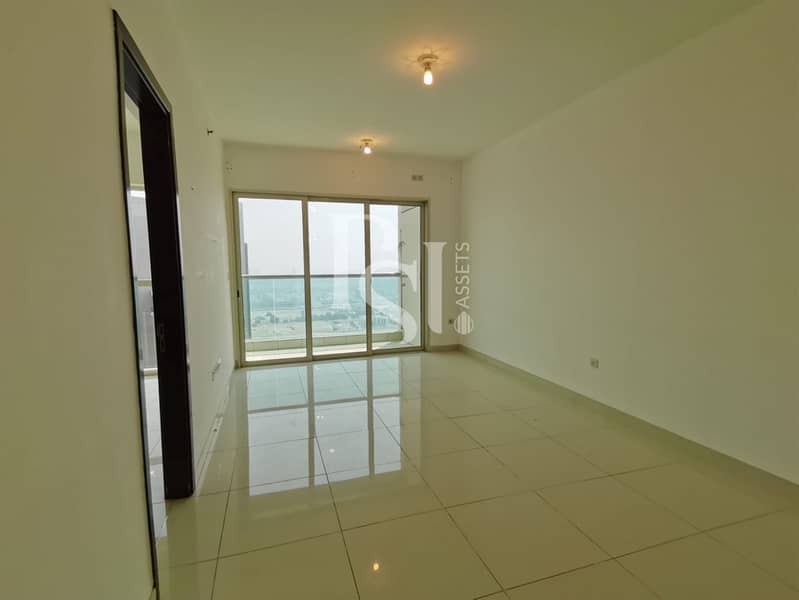 2 1-bedroom-abu-dhabi-al-reem-marina-square-marina-blue-livingroom (2). jpg