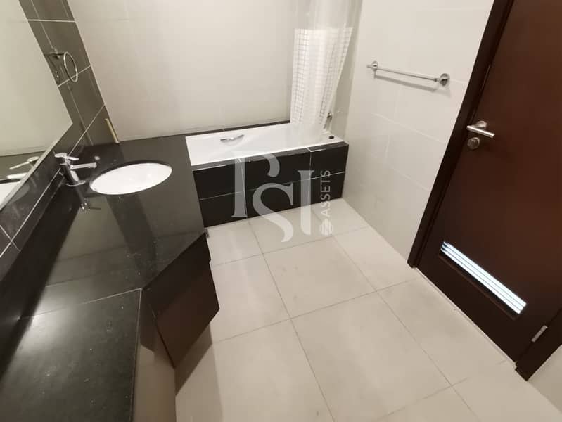 8 1-bedroom-abu-dhabi-al-reem-marina-square-marina-blue-bathroom (1). jpg