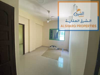 Two-bedroom apartment, hall, 27 thousand in 6 installments, second row from Ajman Corniche, balcony, new split air conditioning, and fully renovated a