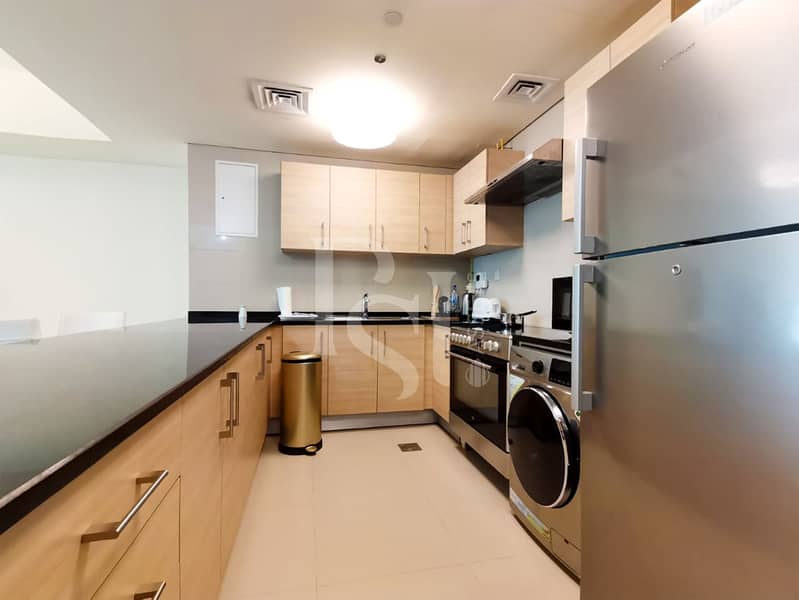 7 1-bedroom-tala-tower-al-reem-abu-dhabi-kitchen (2). jpg