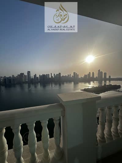 For rent in Sharjah  3 bedrooms and a hall available in Al Majaz 1  Payments in 4 or 6 installments  Gym, swimming pool, parking, air conditioning, fr
