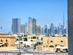 شقة في بناية القوز الثالث 145،القوز 3،القوز 1 غرفة 67000 درهم - 11545548
