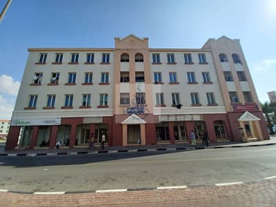 Shop for Rent in International City, Dubai - 4283e4ca-8b71-4ee3-8885-7a9516c2e4ae. jpg