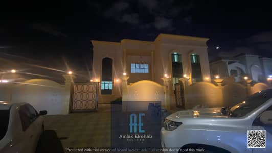 For rent, a distinctive villa in Ajman, land area 10,000 square feet, two floors on a main street
